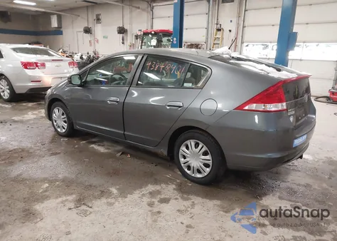2010 Honda Insight Lx z USA, uszkodzony, nr VIN JHMZE2H58AS038570